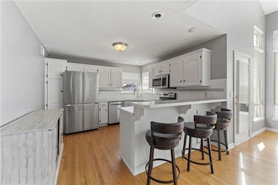 1509 Saddlebrook Rd, Raymore, MO 64083 - photo 6