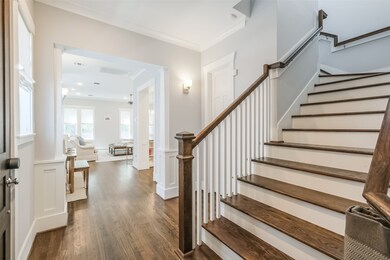 As you enter this charming home you a greeted by h