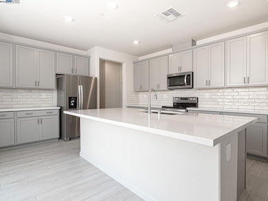 Photo is not of the actual home, but is an inspirational photo of builder’s model home.