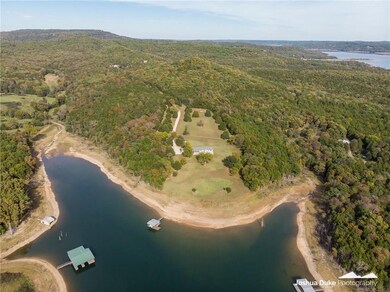 Aerial view of property from lakeside.