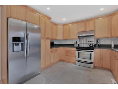 The refrigerator conveys!  This kitchen has lots a