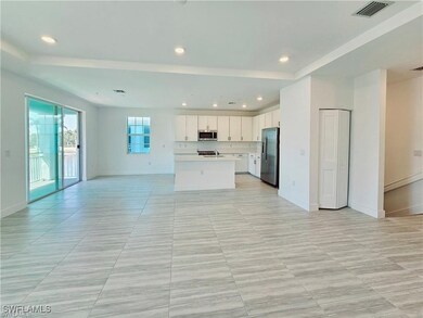 Kitchen with appliances with stainless steel finis