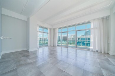 OPEN LIVING ROOM WITH HIGH CEILINGS