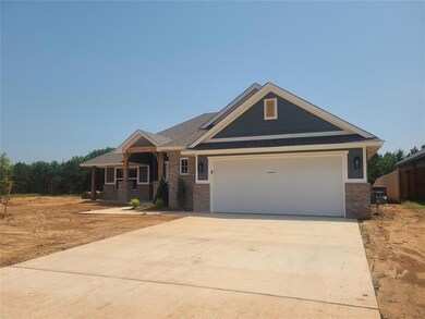 Craftsman house with a garage