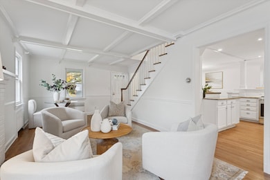 View to the front door in front of the staircase. (To the right side take a look as we are about to enter the kitchen.)