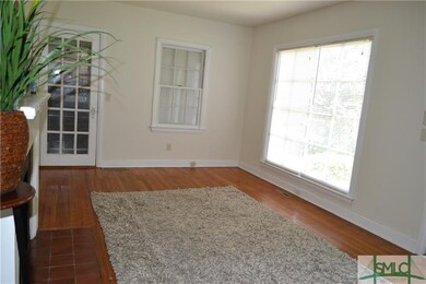 Laundry room/mud room/screened in porch located th
