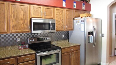 Kitchen, newer appliances, wood cabinetry, granite