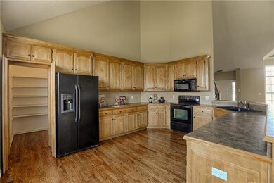 Spacious Kitchen has Walk-in Pantry, Cabinets & Co