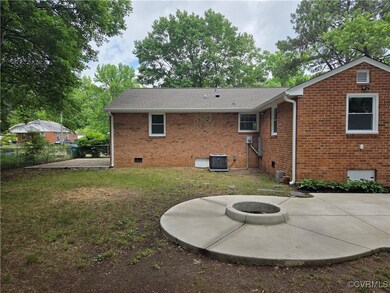 Rear view of property featuring a patio, an outdoo