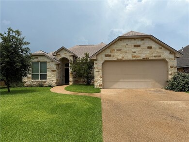 French country style house featuring stone siding,