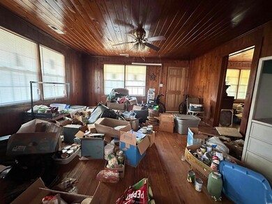 Miscellaneous room with wood ceiling, wooden walls