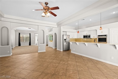 Kitchen featuring appliances with stainless steel