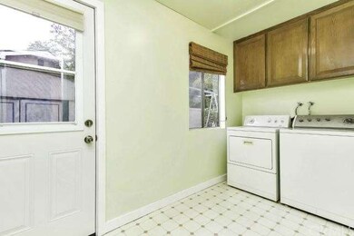 laundry room with side yard entry