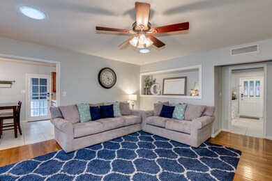 Living Room with Wood Floors & more!