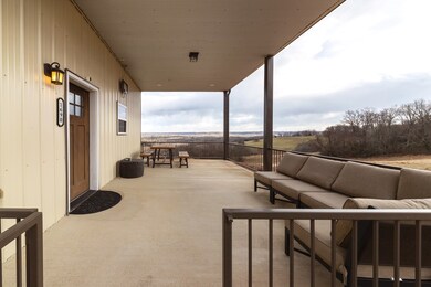 Covered patio overlooks amazing land