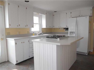 Kitchen. The kitchen has corian...