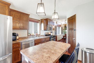 Enjoy updated stainless steel appliances in the kitchen.