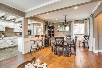 BREAKFAST BAR~DINING~OPEN UP TO KITCHEN~