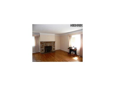 Bright and airy living room with hardwood floors a