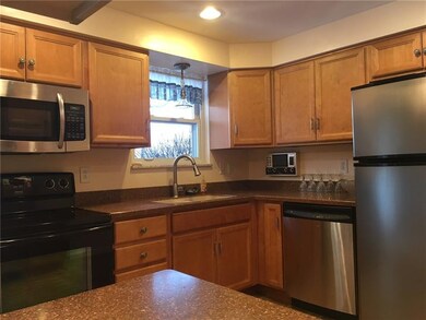 Kitchen with Stainless Steel Fridge, Dishwasher an