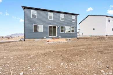 **DISCLAIMER - interior and exterior options may vary**Rear view of property with a patio area