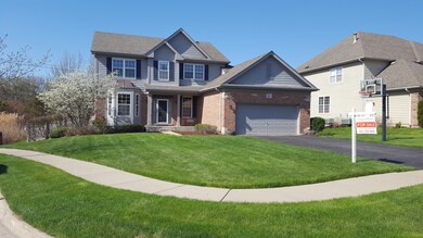 Wide 2 Car Garage and Driveway. Covered Front Porc