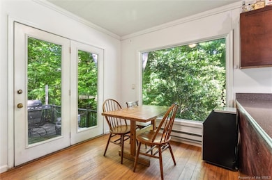 Eat in area with door to deck and large window