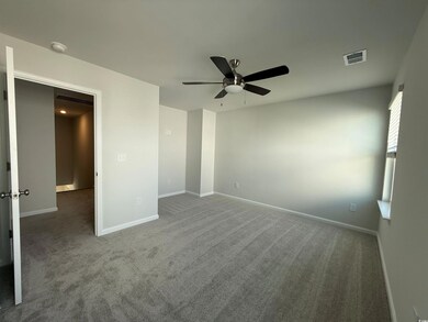 Unfurnished bedroom featuring baseboards, ceiling 