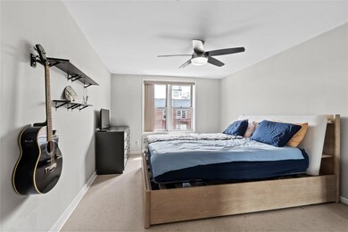 Bedroom featuring baseboards and a ceiling fan