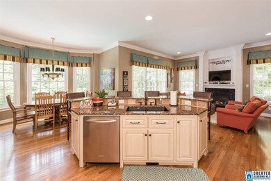 Sink area/breakfast bar overlooking eating space a