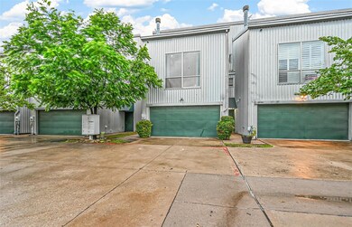 View of property with a garage