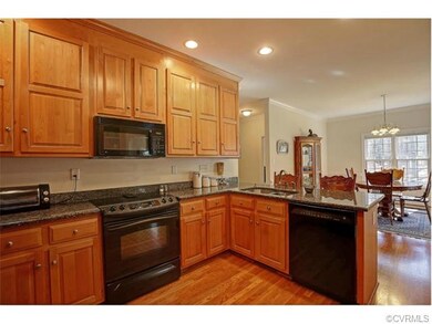 Large kitchen features granite counters, and tons 