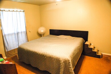 Mast bedroom with fresh paint and natural light.