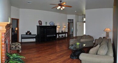 Your oversized living area offers rich wood style 