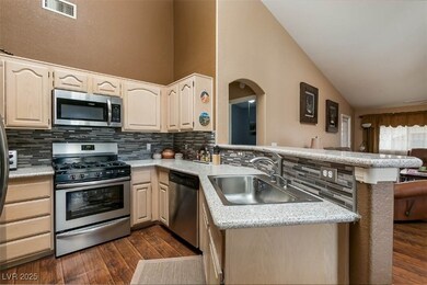 Kitchen with appliances with stainless steel finis