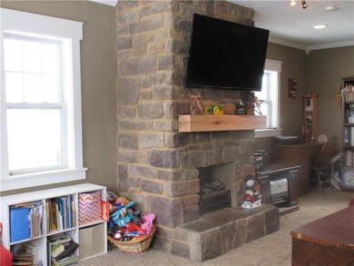Stone fireplace in living room