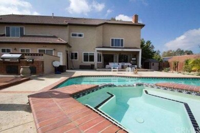 Large flat rear yard with spa and pool