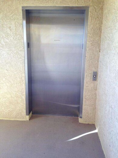 ELEVATOR IN FRONT OF CONDO