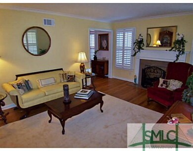 Living Room. The living room is anchored by a marb