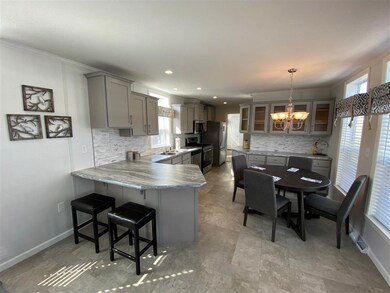 Staged furniture not included as part of sale. Pic