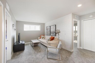 Large upper level loft adds a great hang-out space!! Finishes will vary.