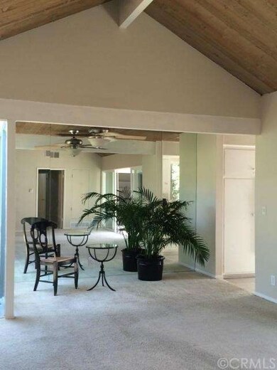 Main living area with mirror wall