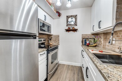 4851 Cedar Springs Rd unit 383, Dallas, TX 75219 - photo 7