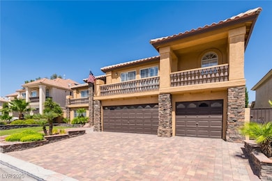 Mediterranean / spanish home featuring a balcony,