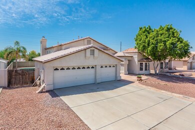 8811 W Wethersfield Rd - MLS-4
