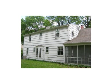 REAR VIEW SHOWING BOW BAY WINDOW AND SCREENED IN P