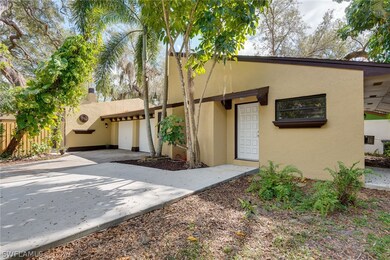 Front of home, 2 car garage and 1/1 apt separate entry