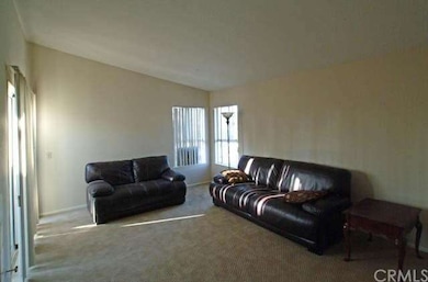 Large living area with high ceilings and plenty of