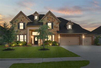 Smart home features for this home include app-controlled everything - pool features, landscape lighting, garage door openers, thermostats, sprinklers - everything!  Stately brick and stone elevation is beautiful both day and night.