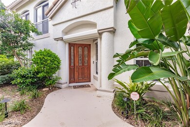 Entrance to property featuring stucco siding